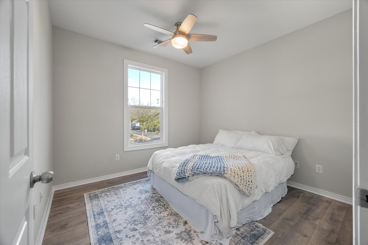 bedroom bedroom fits either a queen or king size bed and has a walk in closet.