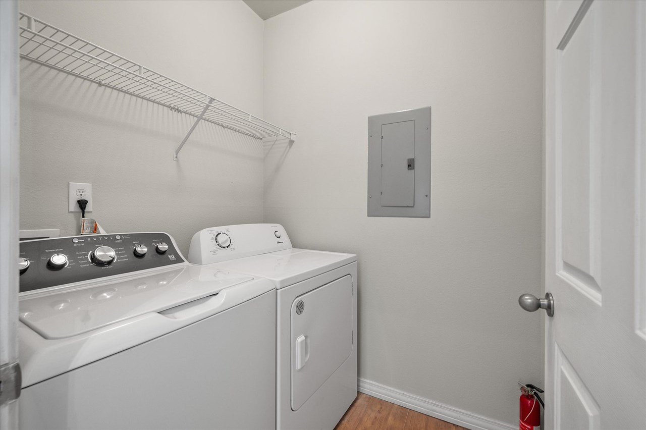 laundry room seperate laundry room and washer and dryer both convey with the sale!