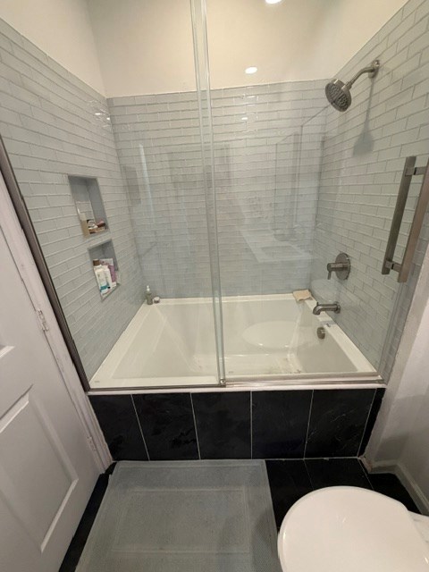 luxury deep soaking tub and slate floors